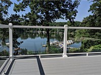 <b>Trex Select Pebble Gray Decking with White Ultralox Aluminum Railing with Full Glass Panels in Severna Park MD</b>
